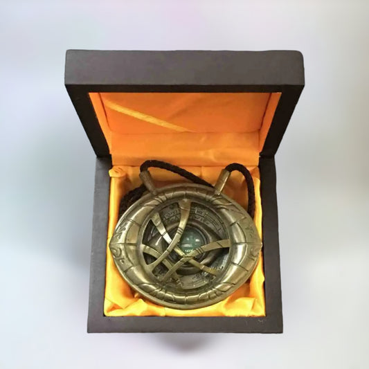 Doctor Strange Eye of Agamotto Necklace in original box on a plain white background.
