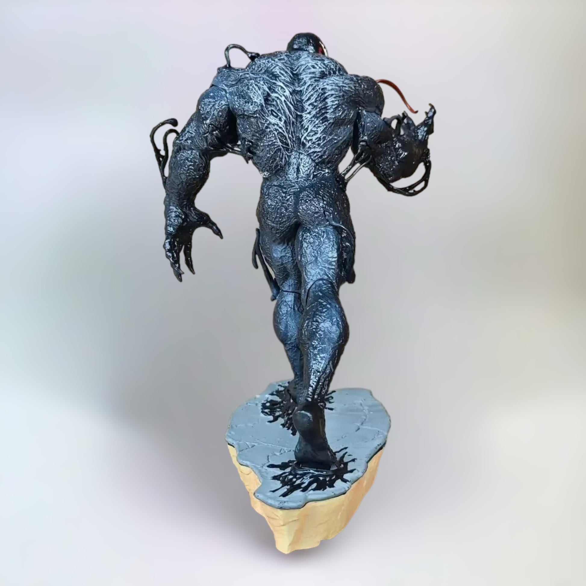 Venom Figure The Last Dance. The back side of a 30cm realistic Venom figure with a plain white background.